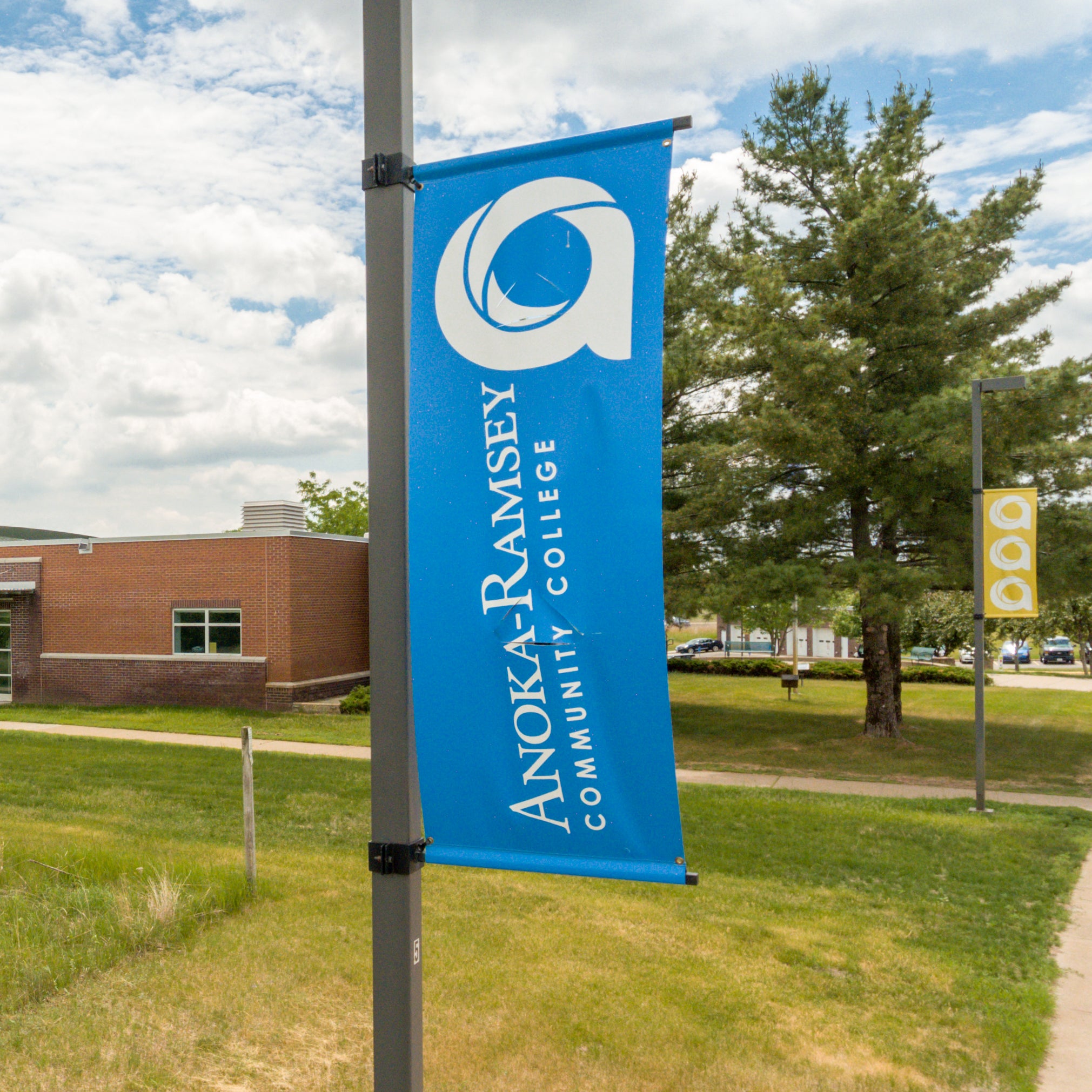 Monument sign featuring Anoka-Ramsey logo