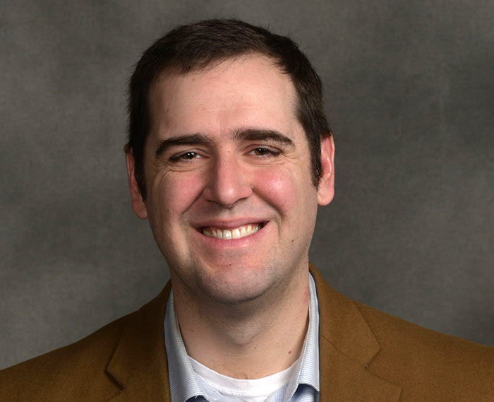 Andrew Buschena Headshot Image
