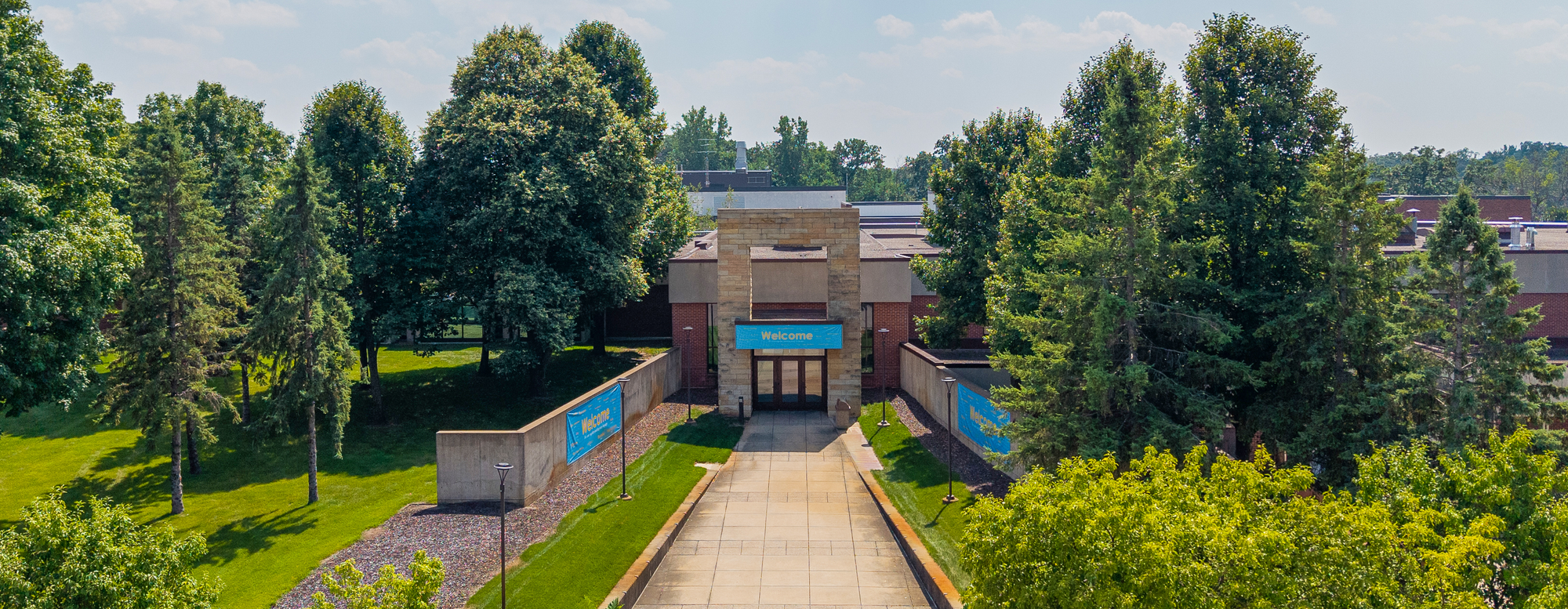 Door 1 entrance Coon Rapids Campus wide angle drone view