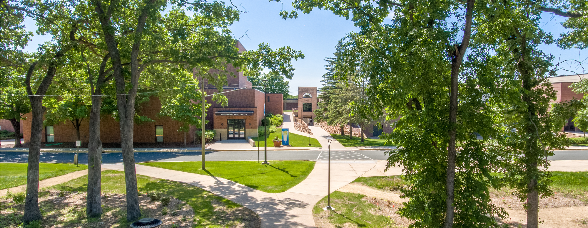 View of entrance to the Performing Arts Center and Health and Wellness Center Gym entrance looking at building from parking lots 1 and 2.