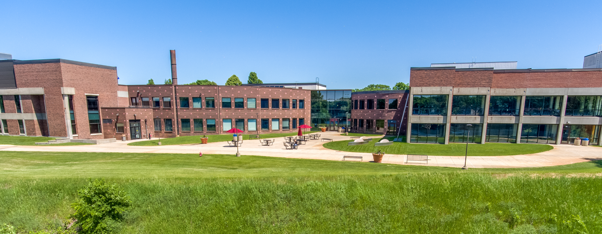 View from the Mississippi River toward the Riverside plaza and College Services entrance. 