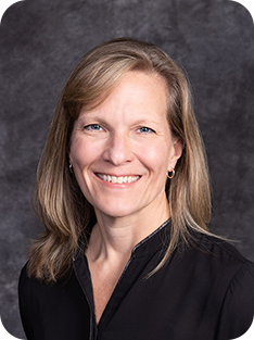 Photo of individual in black shirt